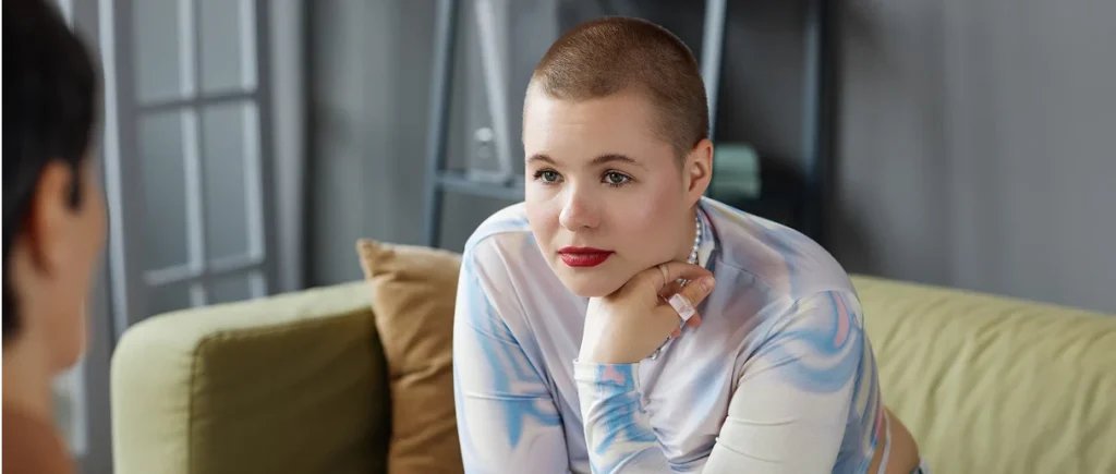 a young person meets with a therapist